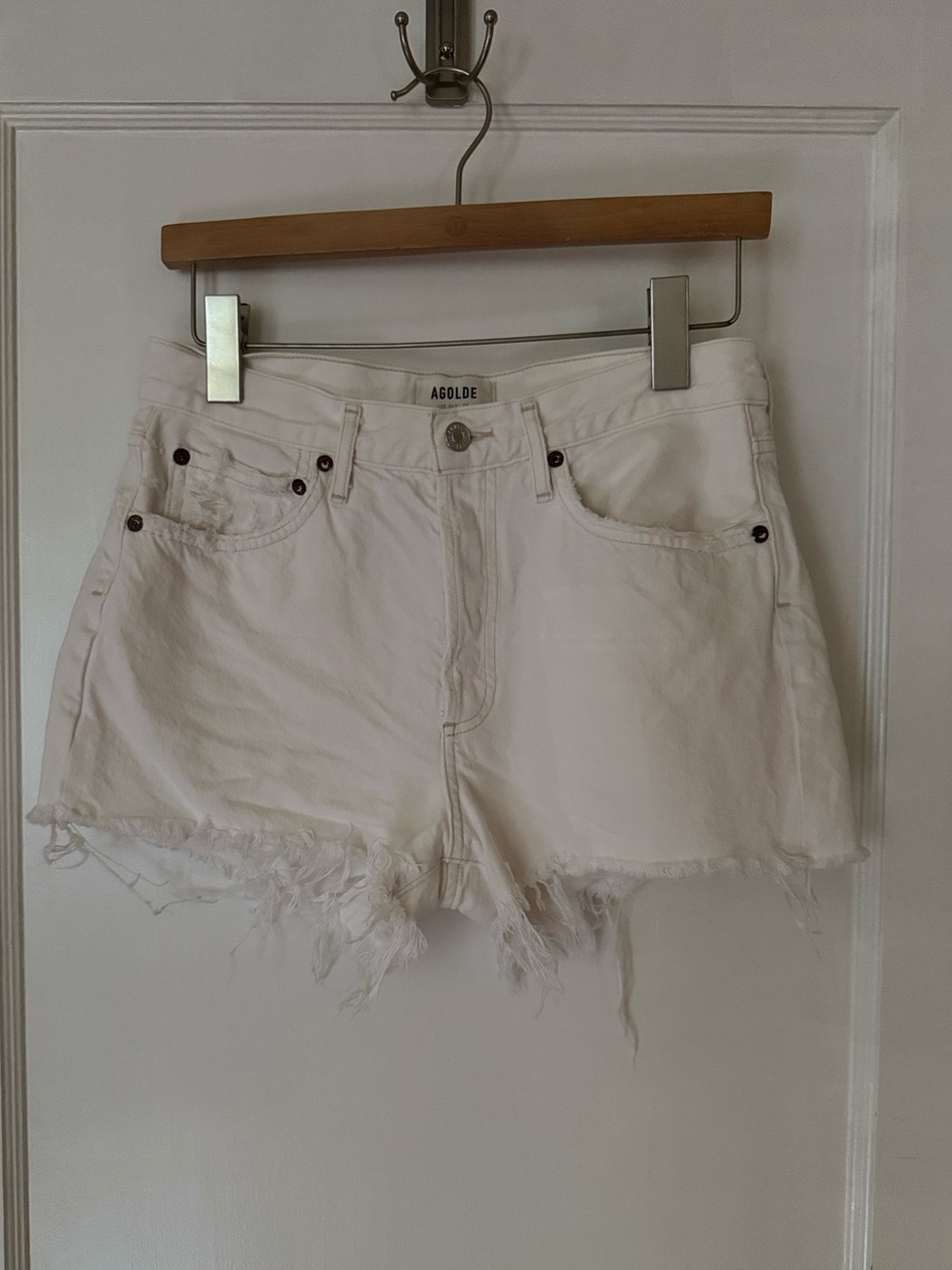 AGOLDE white denim cutoff shorts